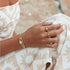 Pura Vida Cowrie Gold Bead Stretch Bracelet